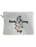 "beauty comes first" quote on pouch makeup bag
