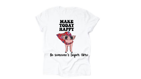 T-shirt with graphic of a pig wearing a cape and goggles, with "make today happy, be someone's super hero" quote