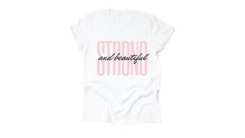White short sleeve t-shirt with pink and black "strong and beautiful" quote