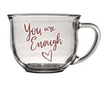 Shimmery "you are enough" quote on clear glass coffee mug