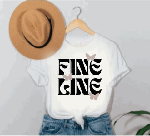 White short sleeve t-shirt with "fine line" quote