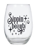 Stemless wine glass with black Sippin Beauty quote