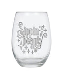 Stemless wine glass with stars and "sippin beauty" funny quote