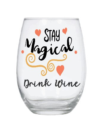 Stemless wine glass with "stay magical, drink wine" quote with hearts